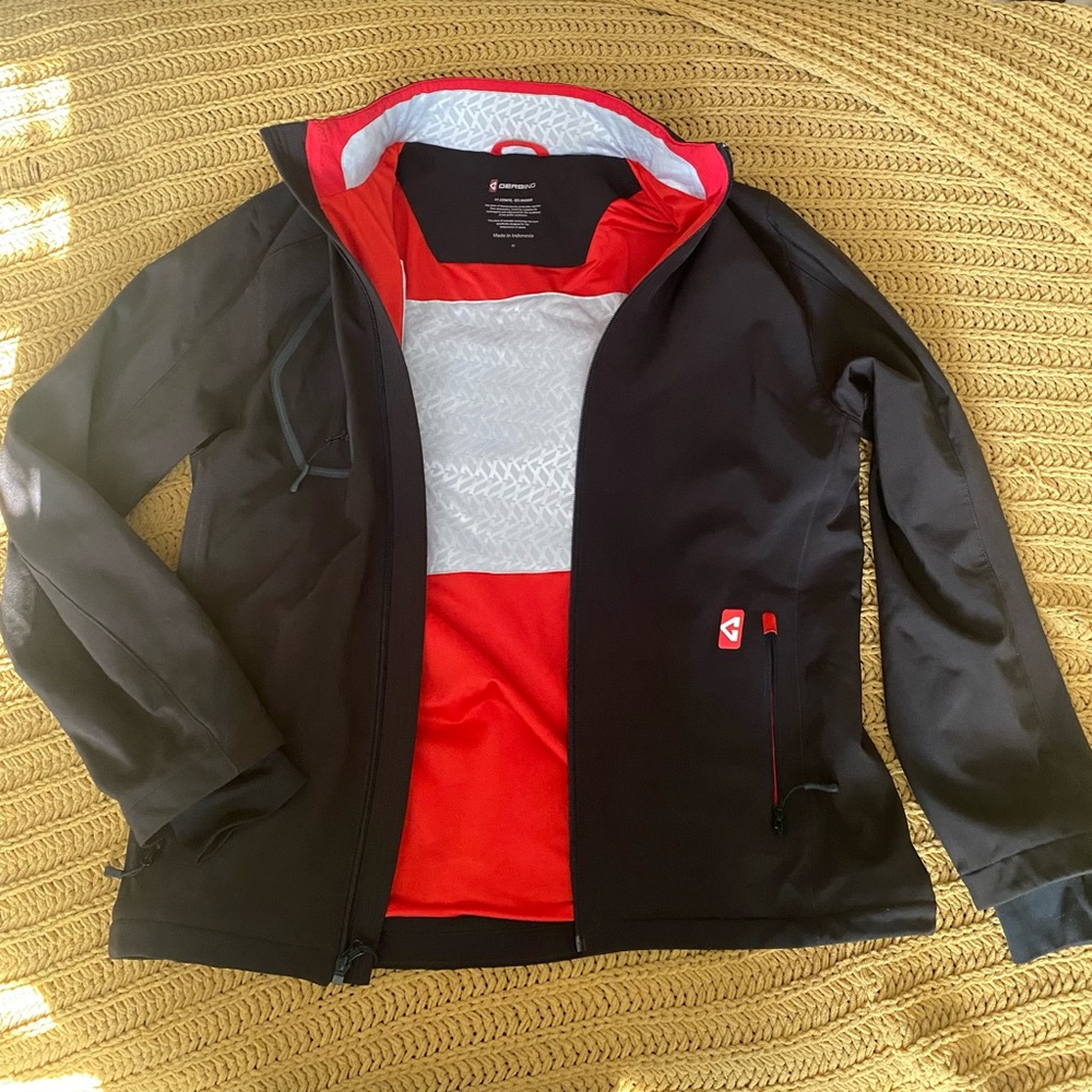 jacket with zip pockets, featuring a lightweight, breathable fabric, waterproof
